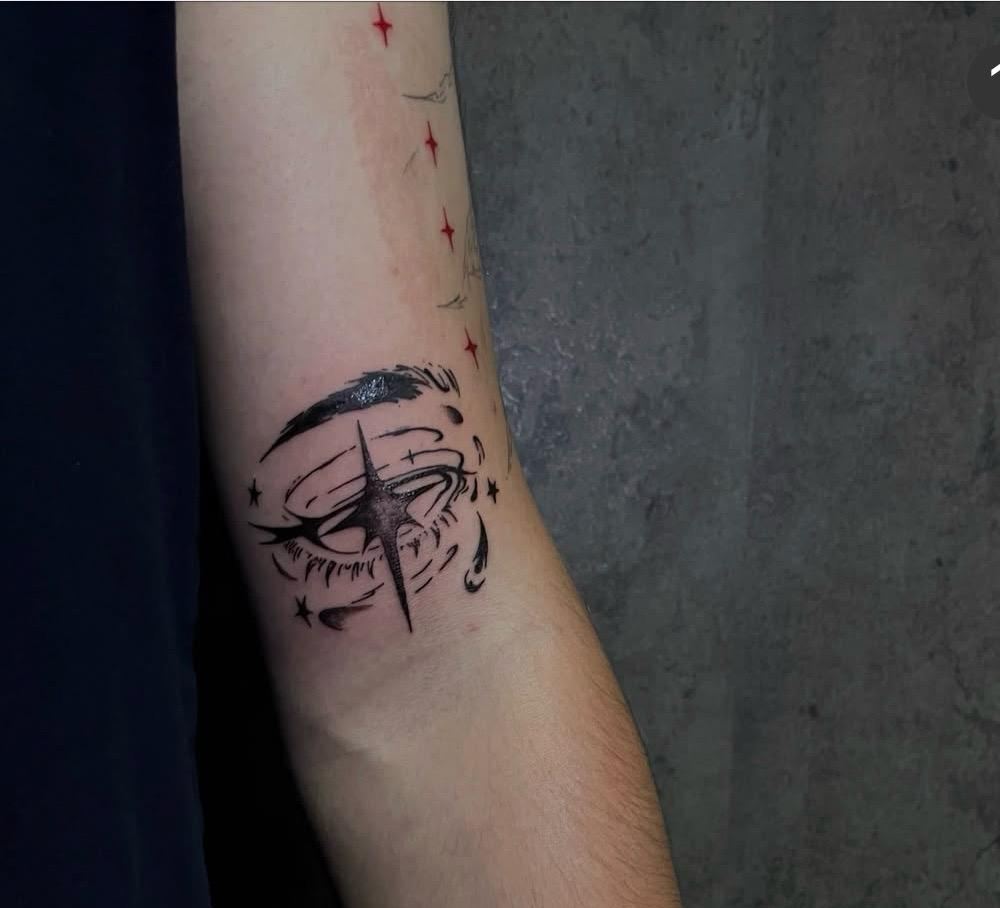 Tetování hvězdy na kůži.